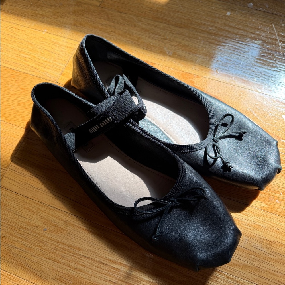 Miu Miu Black Leather Ballet Flats with Ankle Strap and Bow